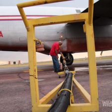 A P2V air tanker being reloaded at Rapid City