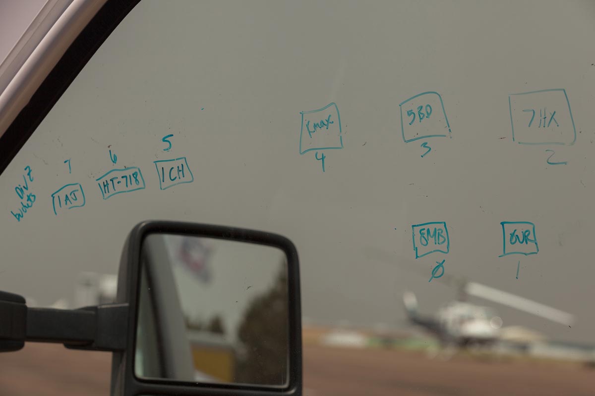 The passenger side window of Durango Helitack's vehicle was pressed into service as a writing surface, showing a diagram of the helibase deck at Show Low, AZ airport for helicopters staged for IA and in support of the Cedar Fire on the White Mountain Apache Reservation.