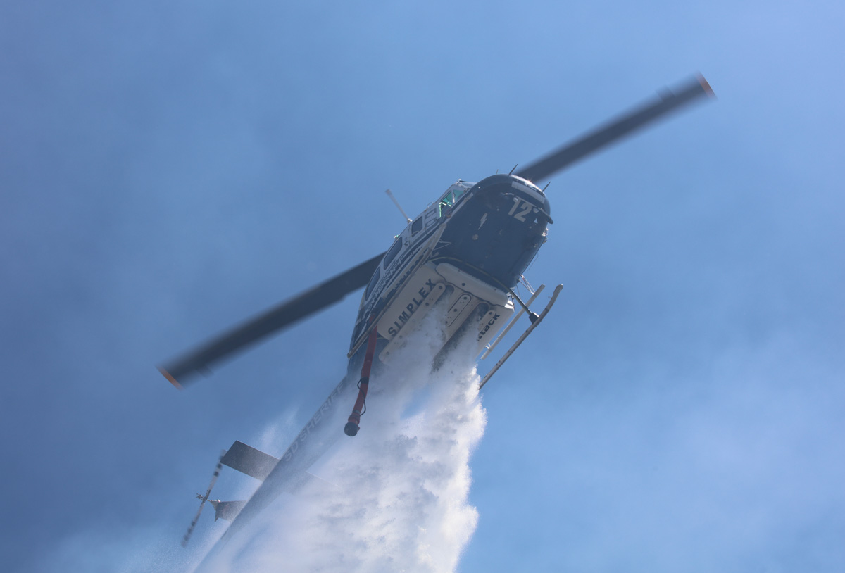 San Diego County Sheriff helicopter drops on a wildfire