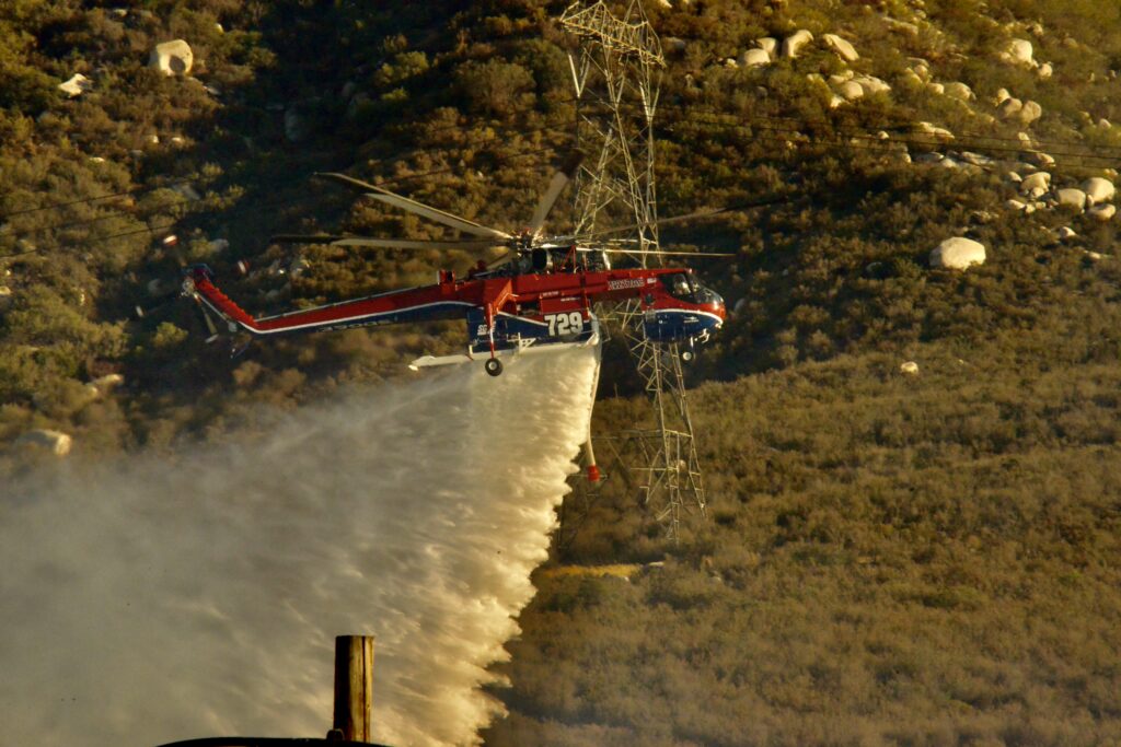 San Diego Gas & Electric’s Helitanker 729 make a drop on the Border 32 Fire in Dulzura, Ca. an unincorporated area of San Diego County. 